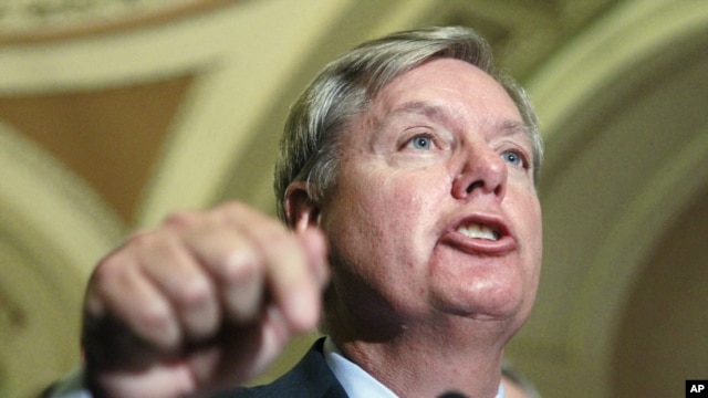 Sen. Lindsey Graham (R-S.C.) speaks to reporters on Capitol Hill in Washington, November 2011 file photo.