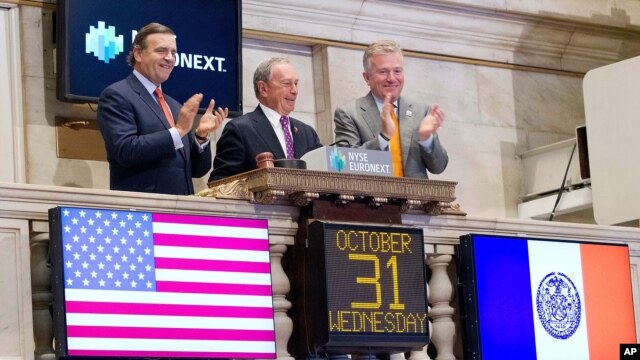 Mayor Michael Bloomberg rings the opening bell at the New York Stock Exchange in New York, October 31, 2012. 
