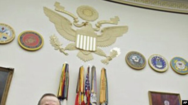 Joint Chiefs Chairman Adm. Michael Mullen (l) and Defense Secretary Robert Gates testify on Capitol Hill, February 16 2011