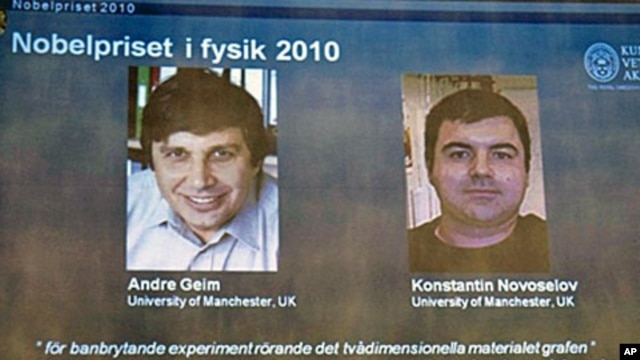 Pictures of Russian-born scientists Andre Geim (R) and Konstantin Novoselov are shown on a television screen at the Swedish academy of sciences in Stockholm following the announcement that they won the Nobel Prize in physics, 5 Oct 2010.