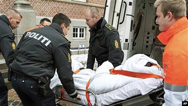 A man who allegedly assaulted Danish cartoonist Kurt Westergaard is carried into court on a stretcher in Aarhus, Denmark (file photo – 02 Jan 2010)
