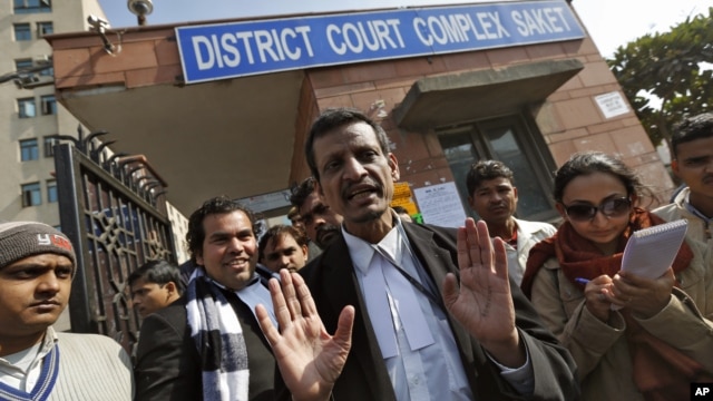 Manohar Lal Sharma (C), lawyer of one of the accused, Mukesh Singh, speaks with the media outside a district court in New Delhi, January 10, 2013. 