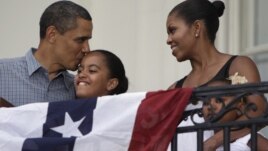 Predsednik Barak Obama, prva dama SAD Mišel Obama sa ćerkama Malijom i Sašom