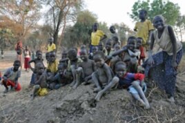 Kids play in the dirt at Doro refugee camp in South Sudan, December 2011.