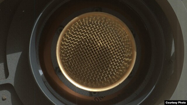 This image from NASA's Curiosity rover shows the open inlet where powered rock and soil samples will be funneled down for analysis. (NASA/JPL-Caltech/MSSS)