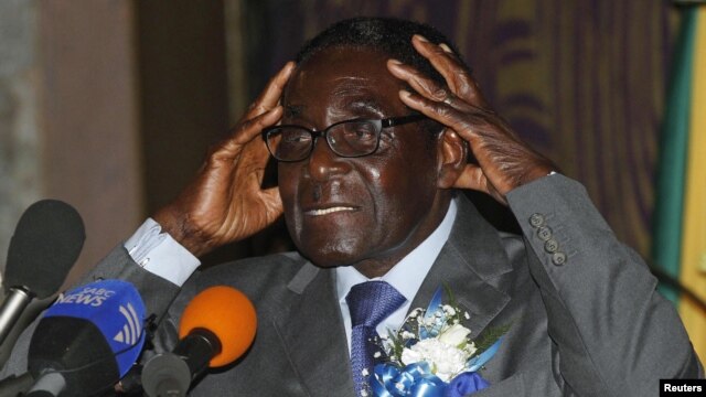 Zimbabwe's President Robert Mugabe speaks at the start of a conference of parties and civic society groups reviewing a draft constitution that, if adopted, will lead to Zimbabwe's next election, at a hotel in Harare, October 22, 2012.