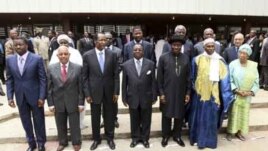 Heads of state and members of the Economic Community Of West African States (ECOWAS) pose for a photograph after attending the 39th ECOWAS Summit in Abuja, March 23, 2011.