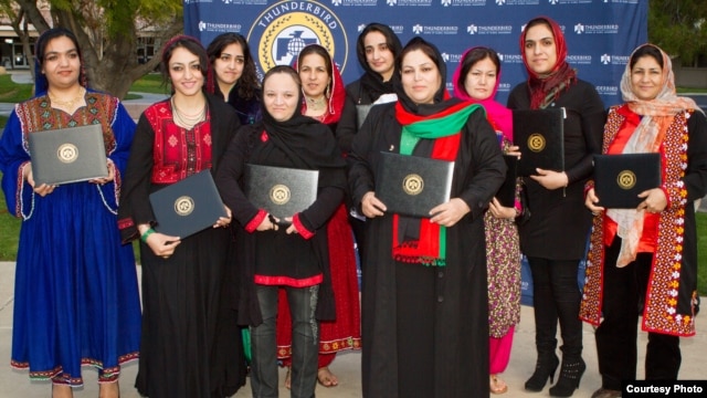 Graduates of the 2013 class of Project Artemis are seen with their diplomas.  (Courtesy Thunderbird School of Global Management) 