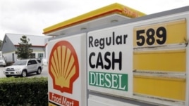 Gasoline priced at $5.89 for regular is advertised at a U.S. Shell station, Monday, Feb. 27, 2012, in Orlando, Florida.  