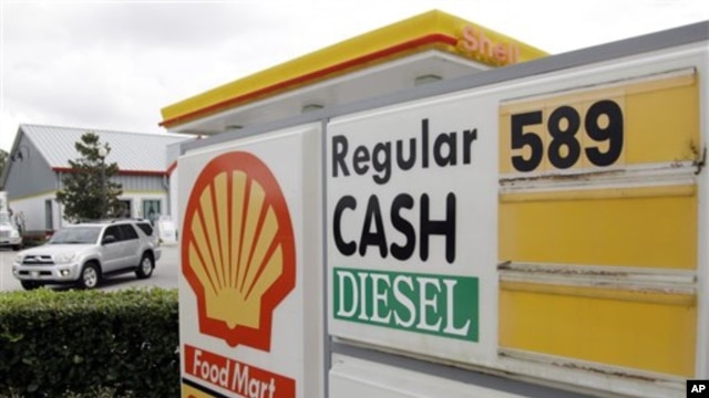 Gasoline priced at $5.89 for regular is advertised at a U.S. Shell station, Monday, Feb. 27, 2012, in Orlando, Florida.  
