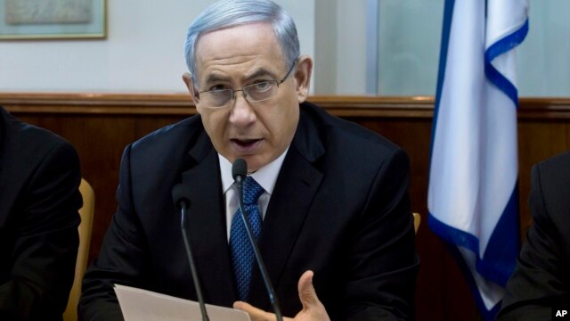 FILE - Israeli Prime Minister Benjamin Netanyahu speaks during in his Cabinet meeting in his office in Jerusalem, Nov. 23, 2014. 