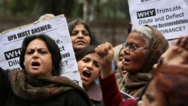 Scores of protesters have gathered near India's parliament house to protest a new law which they say is inadequate to deter all forms of sexual violence against women in New Delhi, India, February 4, 2013. 