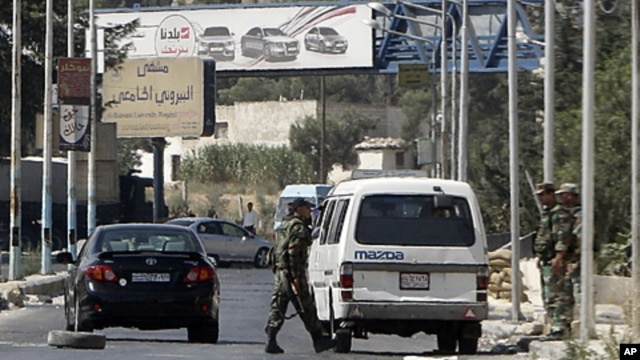 Syrian military checkpoint northeast of Damascus in August (file photo).