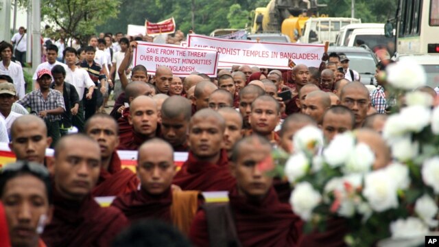 Burmese Buddhist monks march through streets in Rangoon, Burma, October 8, 2012. 