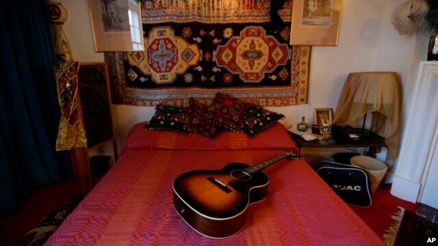 The bed in the former bedroom of U.S. musician Jimi Hendrix at the central London flat he used to live in at 23 Brook Street, London, Monday, Feb. 8, 2016. (AP Photo/Matt Dunham)