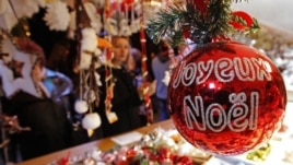 Christmas tree decorations are sold at the Christkindelsmaerik near Strasbourg Cathedral, Nov. 2012.