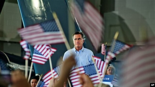 Republican presidential nominee, former Massachusetts Governor Mitt Romney addresses the audience at a rally with the GOP team at the Military Aviation Museum in Virginia Beach, Virginia, September 8, 2012.