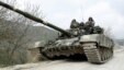 A tank of the self-defense army of Nagorno-Karabakh moves on the road near the village of Mataghis, April 6, 2016. 