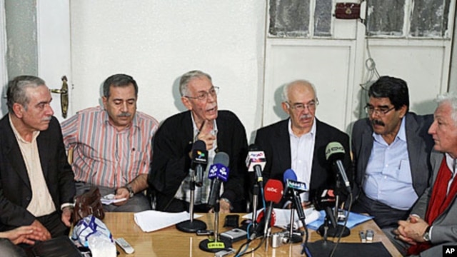 National Democratic Change activists at their meeting in Damascus, September 18, 2011.