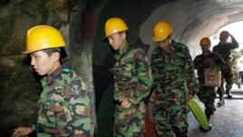 South Korean soldiers visit a tunnel found in 1975 near Cheorwon, on Sept. 18, 2008.