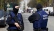 Belgium police officers secure the access during a police operation in Etterbeek, near Brussels, Belgium, April 9, 2016. 