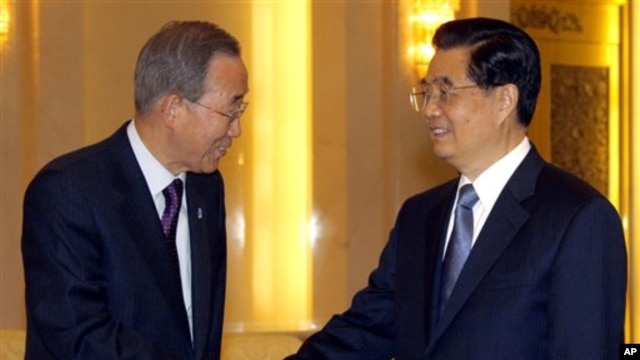 U.N. Secretary-General Ban Ki-moon, left, shakes hands with China's President Hu Jintao during their meeting in the Great Hall of the People in Beijing on Monday, 1 Nov 2010