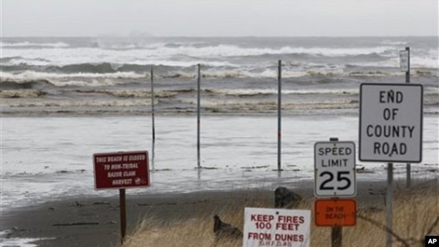 Waves common for a stormy springtime day crash into the beach in Moclips, Washington, March 11, 2011.  A tsunami caused by an earthquake in Japan reached the west coast of the U.S. early Friday, though its impact was minimal.