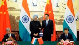 တ႐ုတ္၀န္ႀကီးခ်ဳပ္ Li Keqiang နဲ႔ ျမန္မာ၀န္ႀကီးခ်ဳပ္ Manmohan Singh.