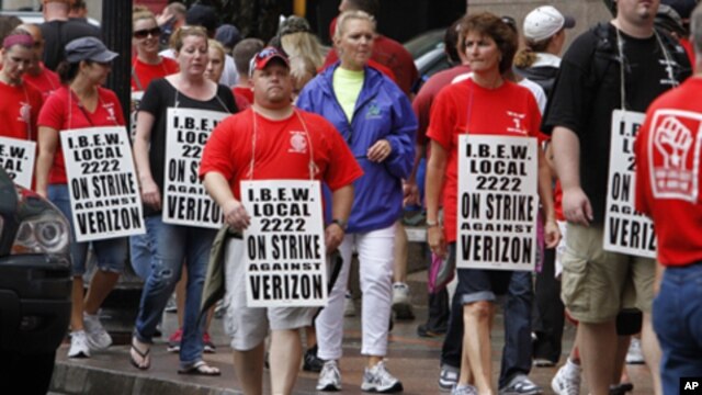 Verizon workers picket outside of the company's New England headquarters in Boston, Sunday, Aug. 7, 2011. Forty-five thousand Verizon Communications Inc. workers from Massachusetts  to Washington, D.C., went on strike Sunday after negotiations fizzled ove