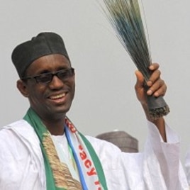 Former anti-graft chief and presidential flagbearer Nuhu Ribadu with a broom, a party symbol, reacts after his announcement as a consensus candidate during the presidential primaries of Action Congress of Nigeria (ACN) in Lagos, 14 Jan 2011.