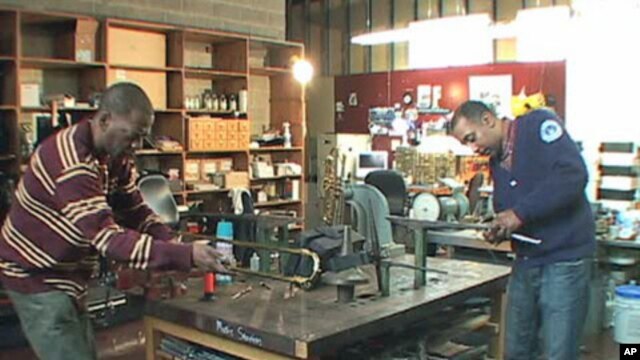 Charles West (left) and Larry Jernigan have been fixing instruments together for almost 20 years.