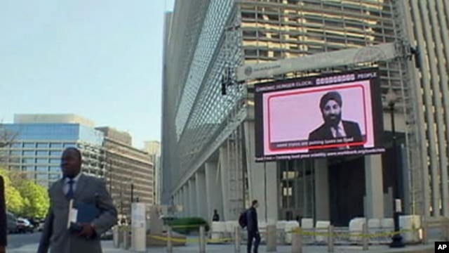 A giant electronic display outside the World Bank's headquarters in Washington, D.C., is tallying the number of chronically hungry people in the world today, April 2011