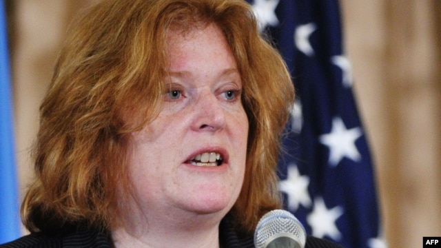 FILE - Assistant Secretary for Population, Refugees, and Migration, Anne C. Richard speaks at an event in recognition of World Refugee Day at the State Department, June 20, 2013. 