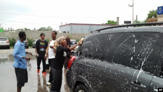 Somali-Americans in Minnesota at a car washing fundraiser to help Somali drought victims.
