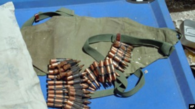 In Mogadishu, AU forces display ammunition left behind by militants.