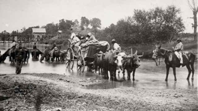 A photograph of fugitive blacks crossing the Rappahannock River in Virginia in August 1862