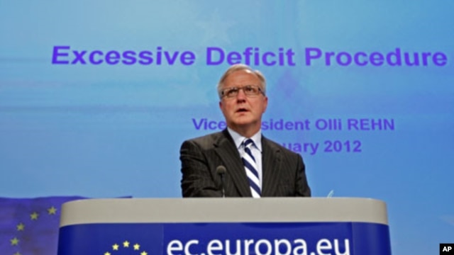 European Economic and Monetary Affairs Commissioner Olli Rehn addresses a news conference at the EU Commission headquarters in Brussels, January 11, 2012.
