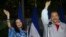Nicaragua's incumbent president Daniel Ortega and his wife, vice presidential candidate Rosario Murillo, left, wave at supporters after casting their ballots in Managua, Nov. 6, 2016. 