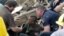 A boy is pulled from beneath a collapsed wall at the Plaza Towers Elementary School following a tornado in Moore, Okla., Monday, May 20, 2013.
