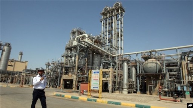 Petrochemical plant at an Iranian port. (2011 photo)  New sanctions target Iran's oil-dependent economy