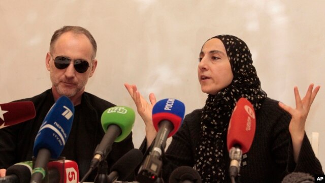 The mother of the two Boston bombing suspects, Zubeidat Tsarnaeva, with the suspects' father Anzor Tsarnaev.