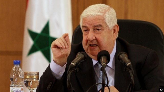 Bộ trưởng Ngoại giao Syria Walid al-Moallem phát biểu trong cuộc họp báo ở Damascus, ngày 27 tháng 8, 2013.