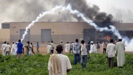 Sudanese demonstrators attack the U.S. embassy as they protest an anti-Islam film, in Khartoum, September 14, 2012.