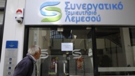 Closed cooperative bank shop in Cyprus,  Mar. 16, 2013