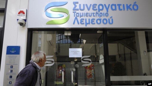 Closed cooperative bank shop in Cyprus,  Mar. 16, 2013