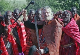 Richard Branson (C), founder of the Virgin Group of Companies, gestures during a ceremony where he was installed as a Maasai elder in the Maasai Mara national Park, 260 km southwest of Nairobi, Kenya, June 2007. (file photo)