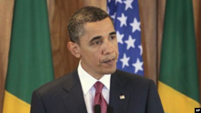 US President Barack Obama makes a statement on the ongoing showdown in Libya, during his news conference at the Palacio do Planalto in Brasilia, Brazil, March 19, 2011