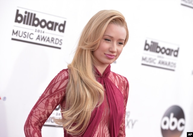 Iggy Azalea arrives at the Billboard Music Awards at the MGM Grand Garden Arena, May 18, 2014, in Las Vegas.