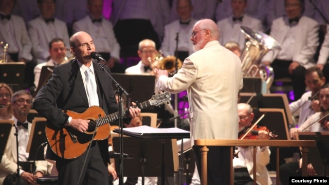 John Williams leading the Boston Pops with James Taylor on July 14, 2012. (Hilary Scott)