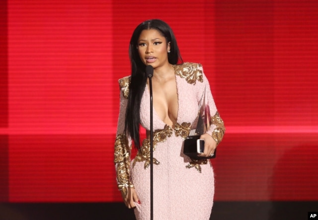 Nicki Minaj accepts the award for favorite album - rap/hip-hop for “The Pinkprint” at the American Music Awards at the Microsoft Theater on Nov. 22, 2015, in Los Angeles.